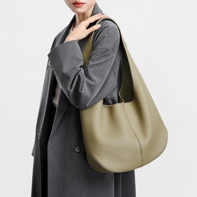 Shoulder bag women's armpit red versatile fashion first layer cowhide commuting sense large capacity women's tote bag