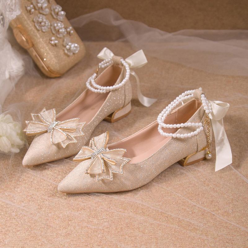 

Bow fairy style satin high heels women s thick heel wedding shoes bride 2025 new autumn one-word buckle strap single shoes 34