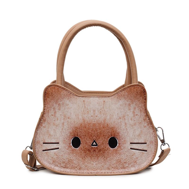 

Cartoon handbag bag women s new cute kitten girl shoulder bag milk huhu niche design messenger bag