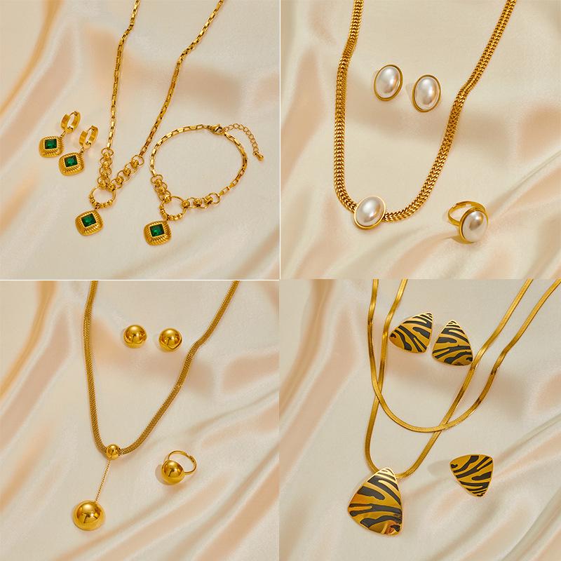 Stainless Steel Women's Jewelry Set: Non-Fading Necklace, Earrings, and Ring - Trendy Fashion Accessories