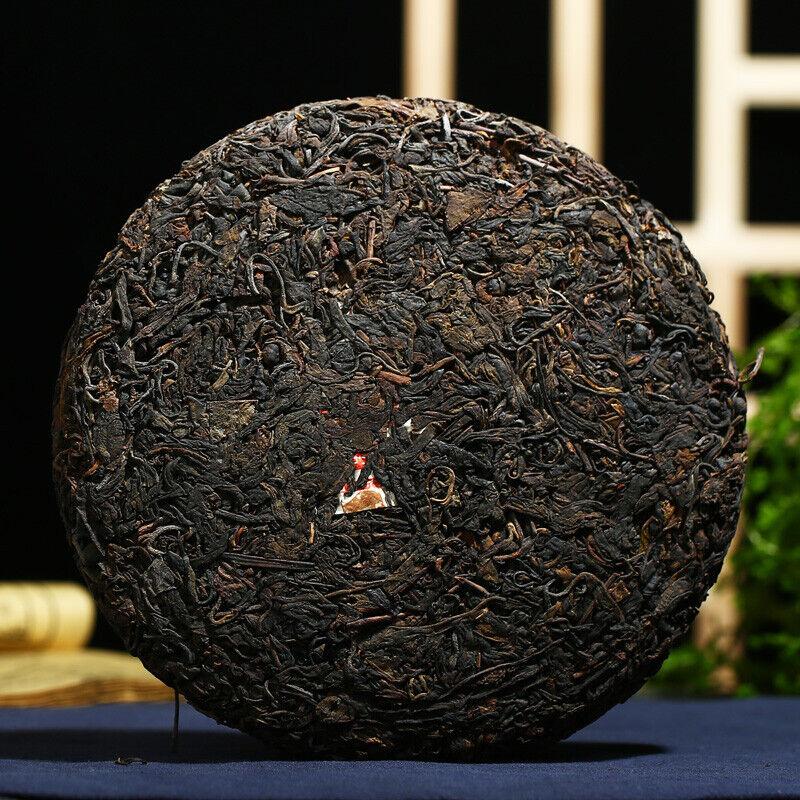 2003 Kong Ming Shan Lisovaný Qizi Cake of Yiwu Classic Tea Puerh Puer Raw 357g