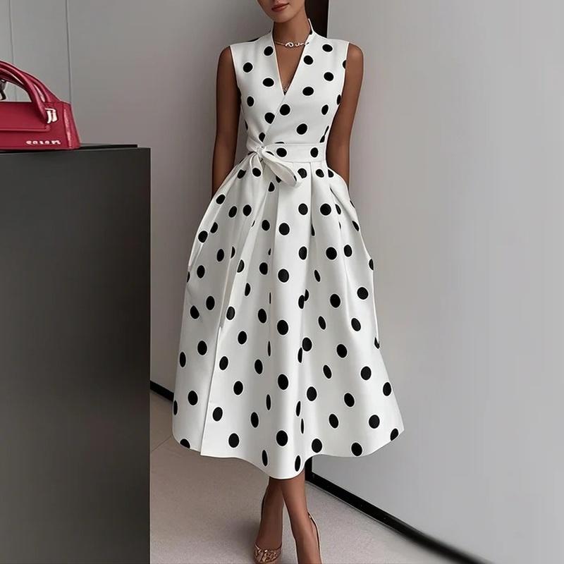 Abito midi a pois da donna senza maniche con colletto a revers e bottoni Vestito svasato