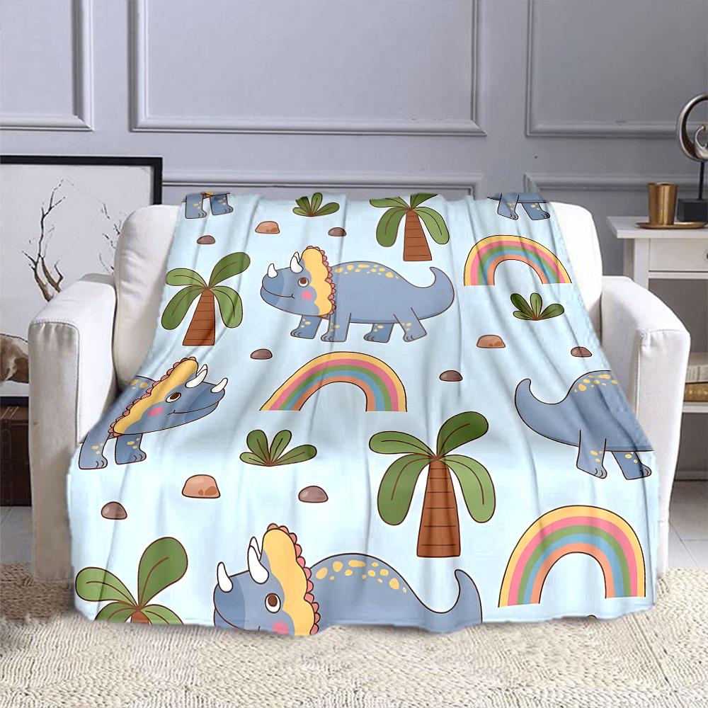 Cute Dinosaur and Rainbow Pattern Patterned flannel blanket perfect for the bedroom living room, sofa, or a little nap