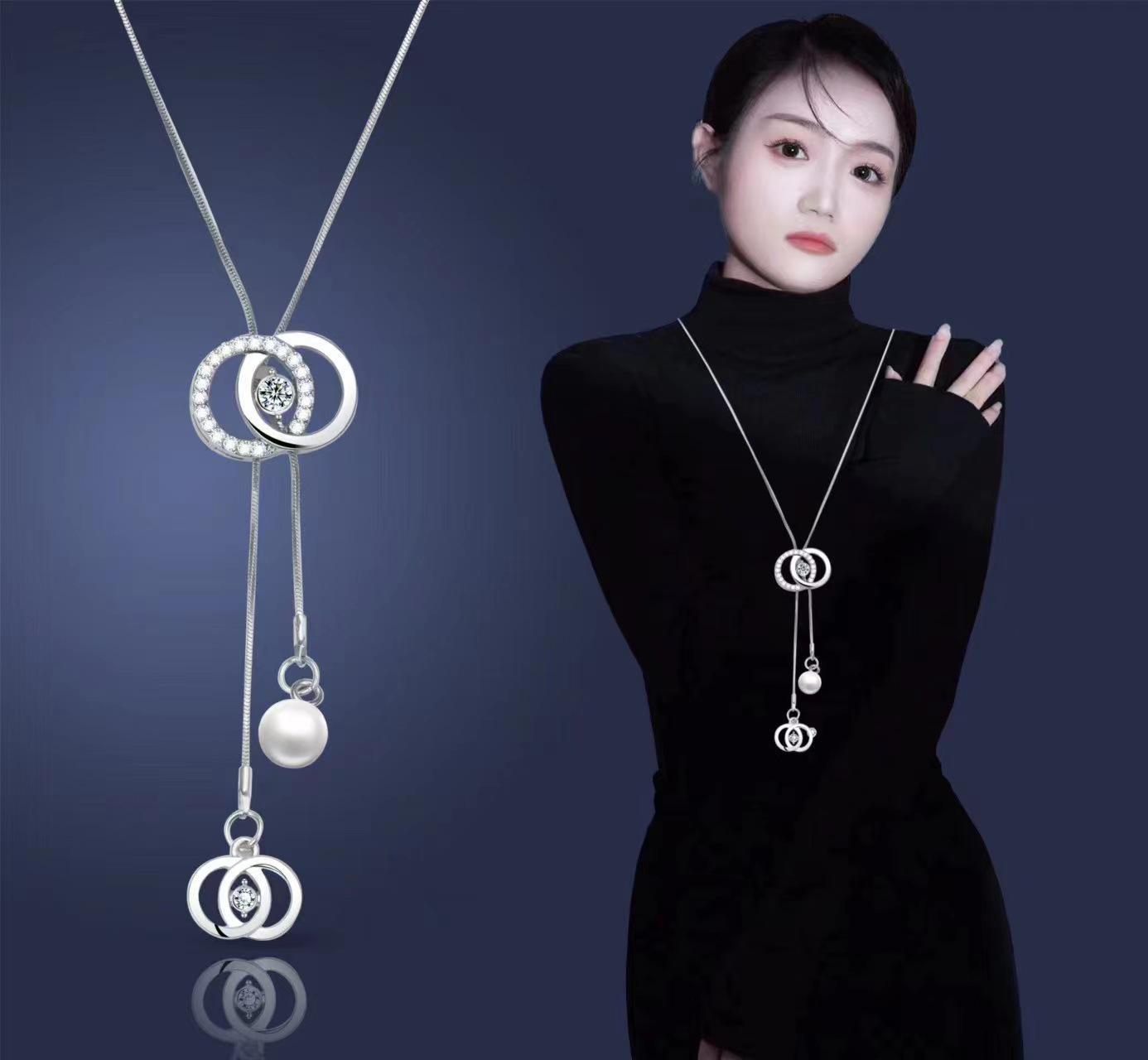 

Женское корейское классическое длинное ожерелье из сплава с подвеской в виде свитера - не выцветает, регулируется для осени и зимы