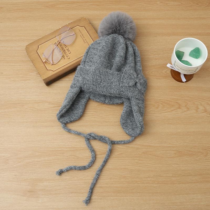 Hat women's autumn and winter cute hairball knitted wool hat thickened ear protection warm fashionable versatile