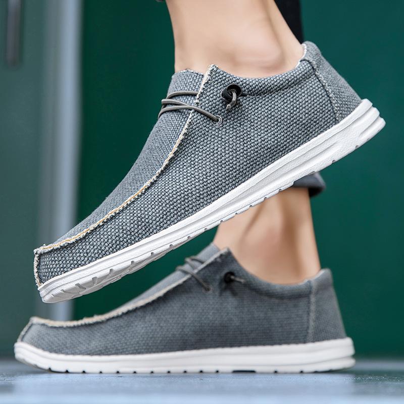 Customized factory large size dude loafers tide 2025 casual shoes men's soft soles lightweight canvas shoes men's shoes