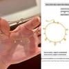 Elegant French Retro Heart Tassel Diamond Pendant Bracelet - High-End Fashion for Women.