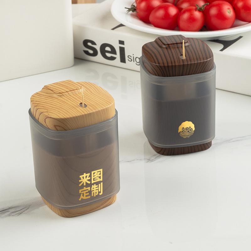 Luxusní domácí špičkový personalizovaný kreativní držák na párátka s tlačítkovým mechanismem