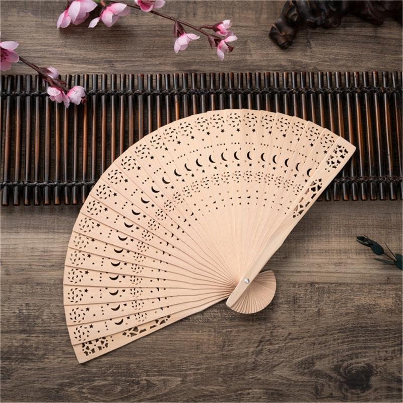 Portable Traditional Engraved Wooden Folding Fan With Lightweight Design Ideal For Cultural Celebrations