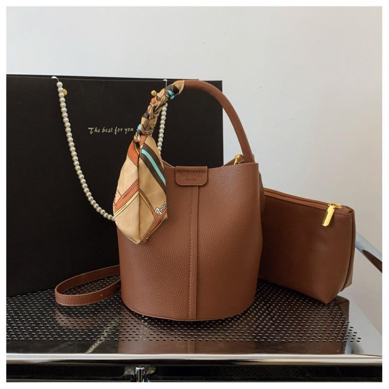 

Summer fashion handbag solid color new French small fresh shoulder messenger bag foreign style bucket bag коричневий