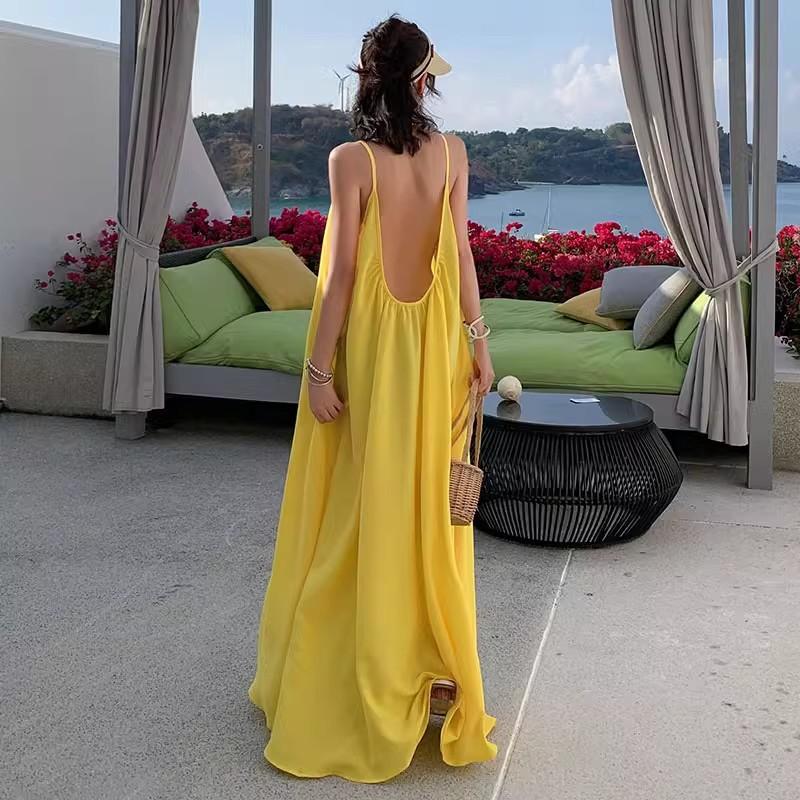 Seaside Vacation Sexy Backless Suspender Dress Women's Summer New Loose A-word Skirt Gentle Yellow Long Skirt