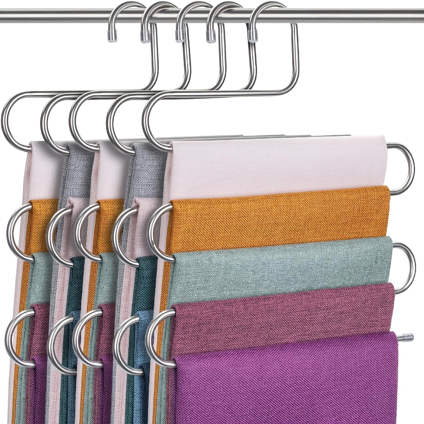 

A multi-layered metal trouser hanger with S-shaped clothes clips for wardrobe organization, anti-slip storage, drying L светло-серый