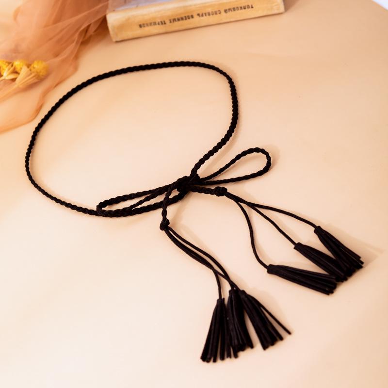 

Женский плетеный пояс с кисточками - Кожаный плетеный тонкий веревочный корсетный аксессуар чёрный