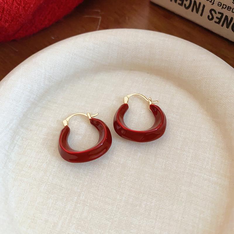 Zirkon Perlmutt Sunburst Ohrklemmen: Elegante, vielseitige Ohrringe für Frauen.