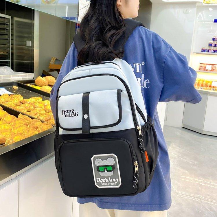 Schoolbag new Korean version ins lightweight load reduction wear-resistant versatile large-capacity schoolbag junior high school high school student