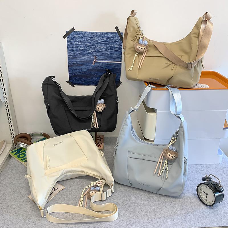 Korean version of messenger bag women's new simple large-capacity dumpling bag lightweight versatile satchel student shoulder bag tide