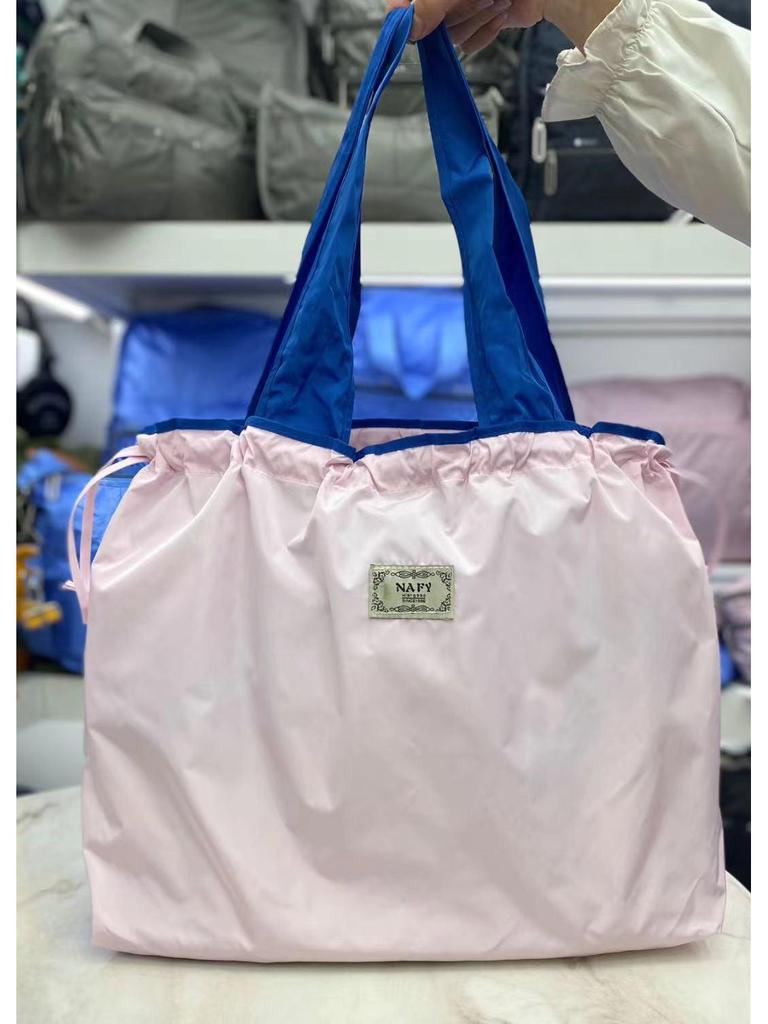 Eco-friendly Lightweight Water-repellent Foldable Shopping Bag with Drawstring Closure and Large Capacity