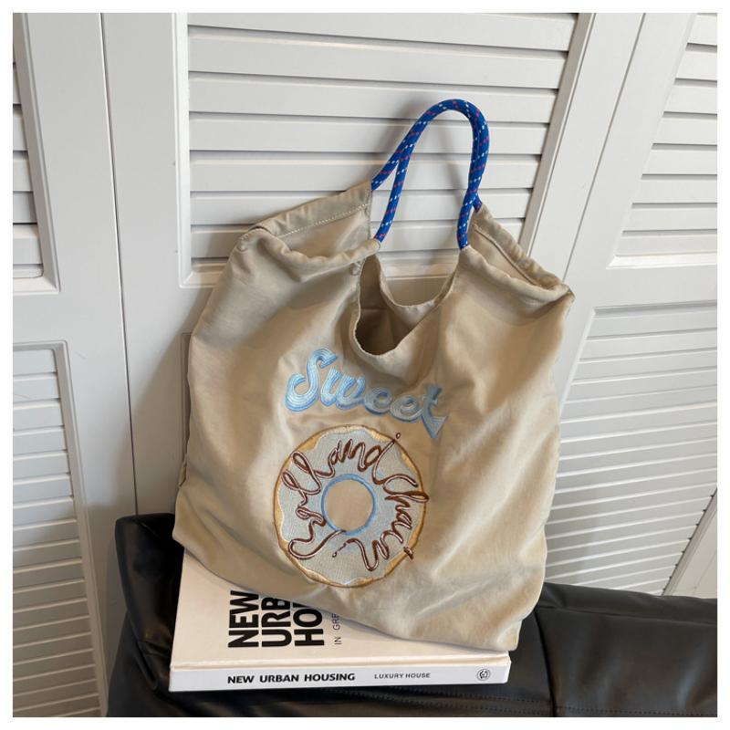 

Маленькая вышитая сверхлегкая тканевая сумка для женской сумки, тканевая сумка-пончик на одно плечо one size бежевый