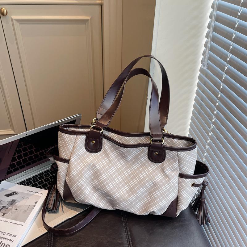 Neue einfache Retro-Textur-Tasche Mode Umhängetasche Temperament Pendeln Große Kapazität Achsel-Schultertasche Tragetasche