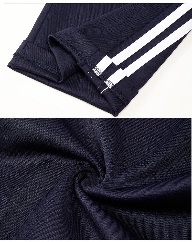 Unisex Dark Blue Straight-Leg School Uniform Pants with Double White Stripes, Ideal for Spring and Autumn.