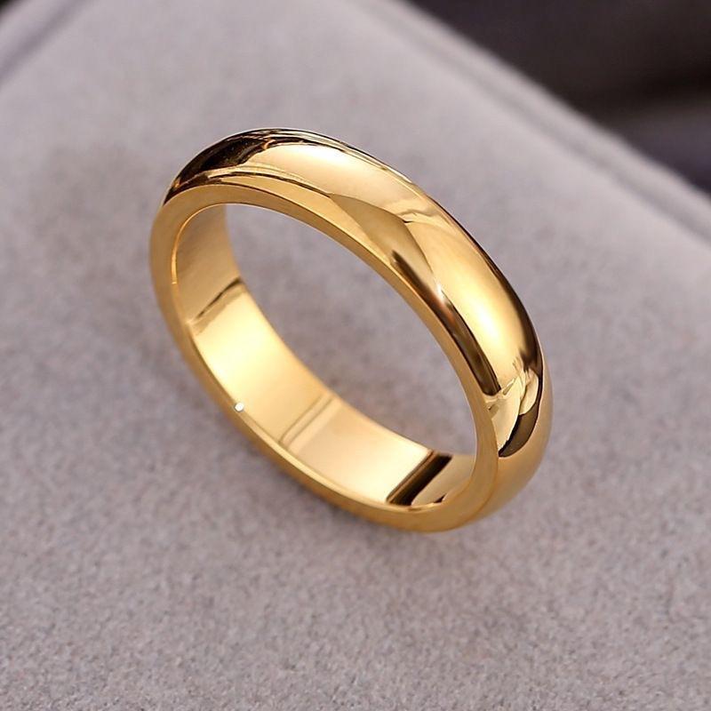 Ring in a Golden Gloss End, Featuring a Modern Minimalist Design Suitable for Weddings And Everyday Use. Showcasing a Stylish Polished Surface