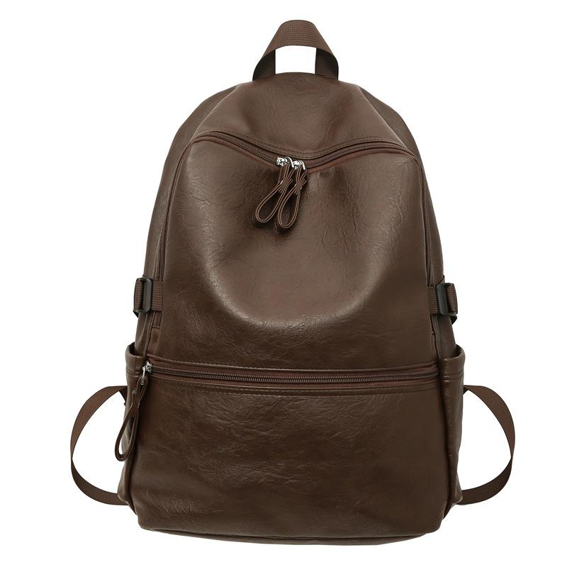 

Retro PU schoolbag female college student high school junior high school student simple large capacity computer backpack male commuter backpack tide