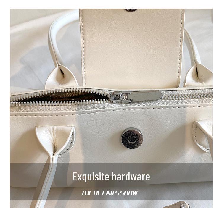 2026 French Light Luxury Cowhide Long Handle Dumpling Baguette Crossbody Bag