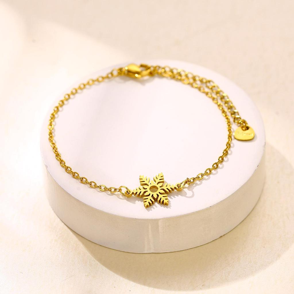 Europäisch-Amerikanisches Schneeflocken-Armband aus Edelstahl - Nischen-Weihnachtsdesign, High-End & Vielseitig.