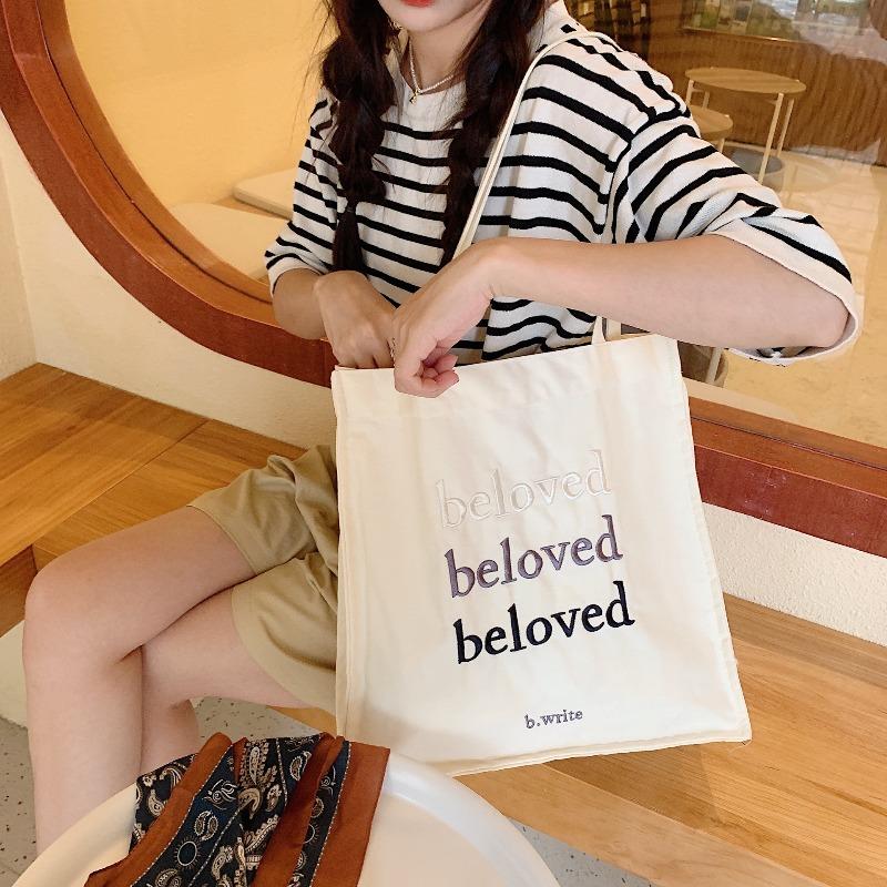 

41 Embroidered Canvas Bag Simple Solid Color Girl Student Shoulder Bag темно-синього кольору