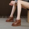 Wedge heel thick-soled leather single shoes women's 2025 new 12cm inner height increase pointed waterproof front strap-on deep mouth single shoes