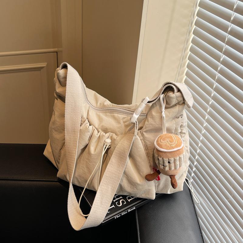 Bag women's large-capacity new simple and versatile pleated shoulder messenger bag class tote bag