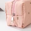 Large Capacity Makeup Organizers with Quilted Bowknot Accent and Multiple Divisions for Efficient Travel