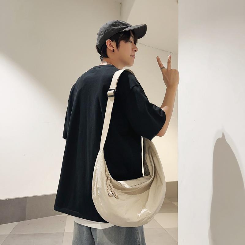 Borse a tracolla da uomo e da donna, borse a spalla, borse diagonali a grande capacità, borse nere a forma di raviolo, borse in tessuto alla moda.