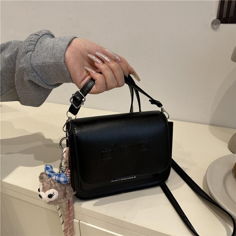 

Design sense versatile solid color fashion small square bag women s trend autumn new printed simple commuter messenger bag No pendant чёрный