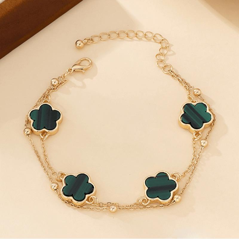 Шикарный металлический браслет-цепочка с четырехлистным клевером золотой