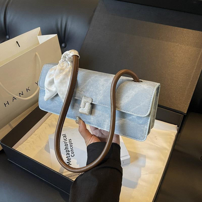 Niche design bag women's new versatile shoulder underarm bag portable baguette bag