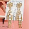 Bohemian Nutcracker Dangle Earrings with Sparkling Rhinestones – Golden-Tone Soldier Design, Festive Holiday Party Jewelry for Women, Perfect Christma