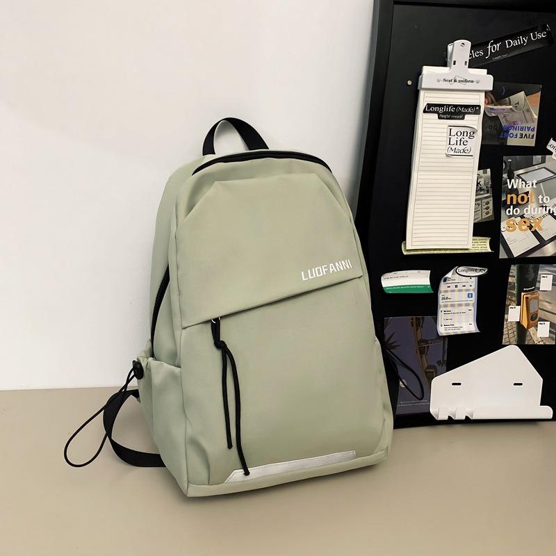Schoolbag schoolbag female college student ins trendy brand backpack men's sense lightweight travel backpack simple solid color printing