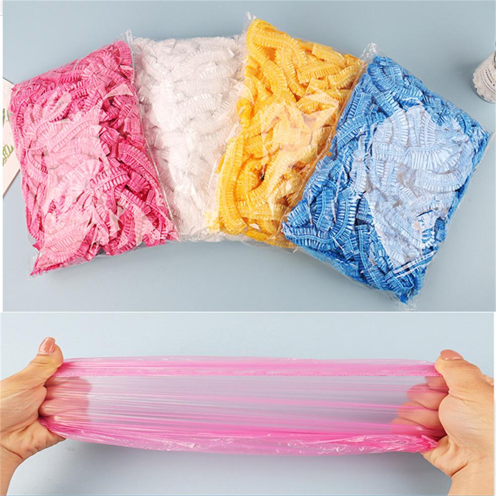 100 adet/set Tek Kullanımlık Duş Bone Plastik Su Geçirmez Başlık Pembe Spa Salonu Otel Saç Boyama Kadın Elastik Saç Bonesi Banyo