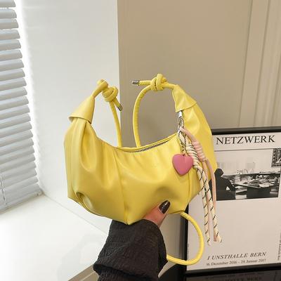 Sac simple de couleur unie pour le printemps et l'été, nouveau sac en forme de ravioli, croissant, design de niche, sac à épaule léger, sac bandoulière