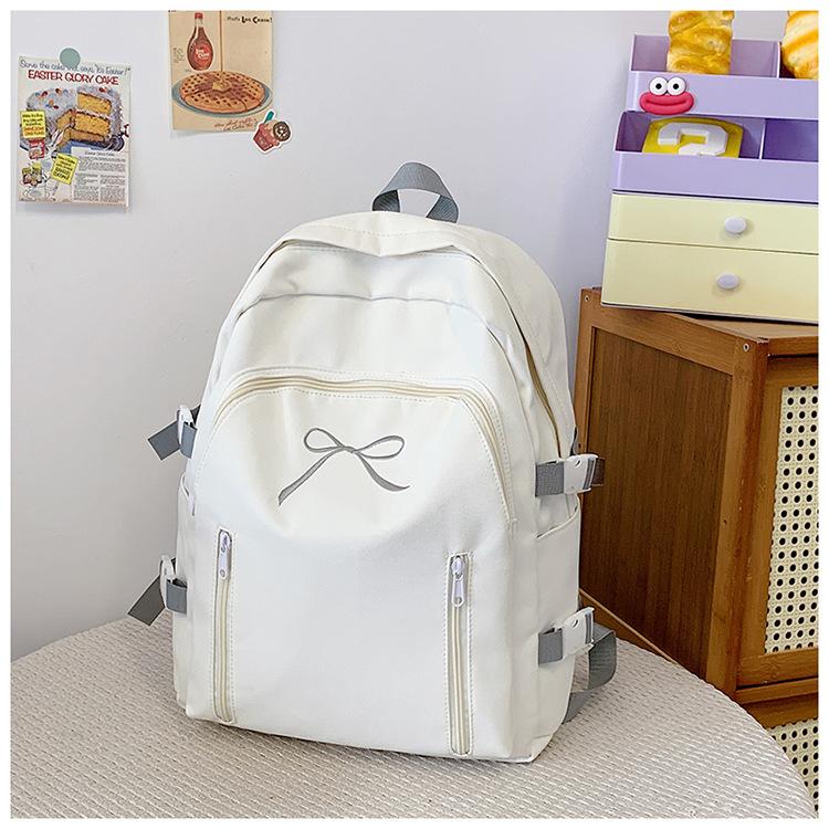School bag cute Korean version versatile junior high school students casual simple solid color bow back