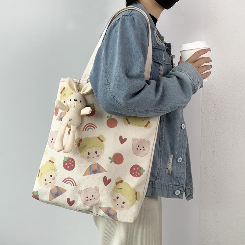 

Cute Printing Canvas Shoulder Bag With Doll Pendant Handheld Canvas Bag New Shoulder Bag