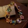 Gebrauchtes High-End Vintage Armband in Süßigkeitenfarben mit Blumenmuster