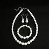 Elegante Set di Gioielli in Perle e Diamanti con Collana, Orecchini e Bracciale