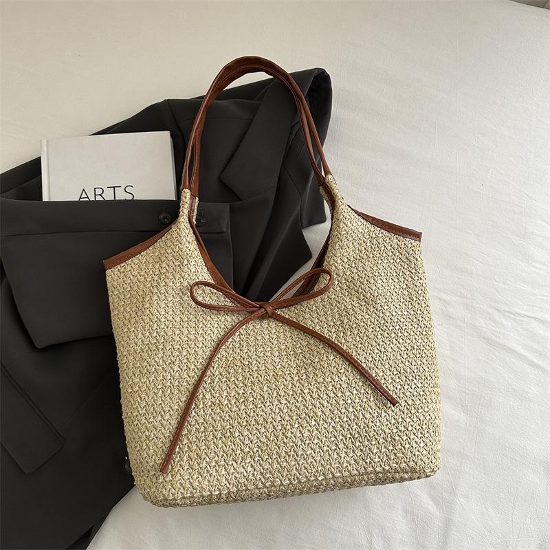 

Корейская нишевая сумка ретро высокой ценности женская весна-лето 2025 новая плетеная сумка-тоут с вставками коричневый