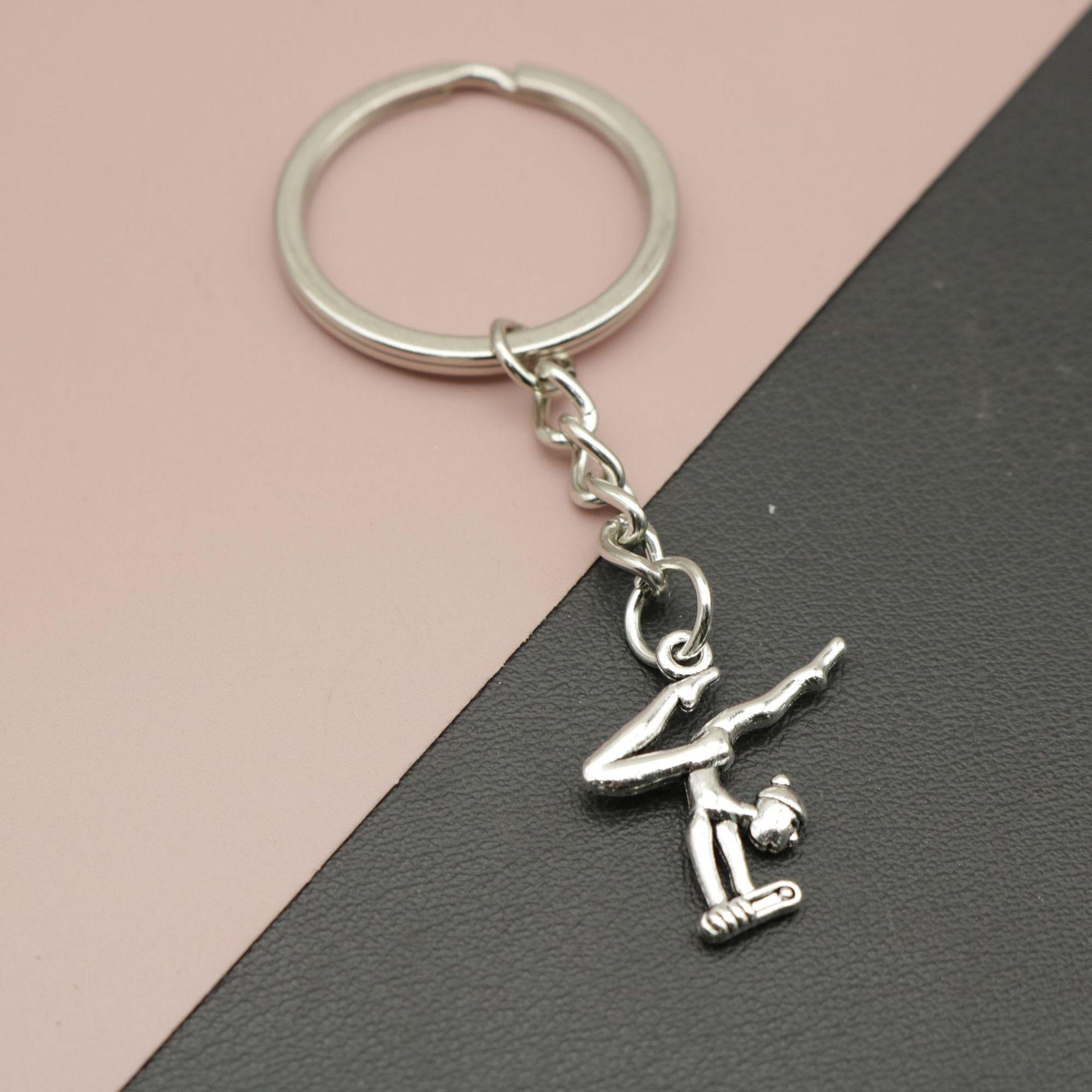 Hot Selling Simple Gymnastics Athlete Keychain Pendant серебряный