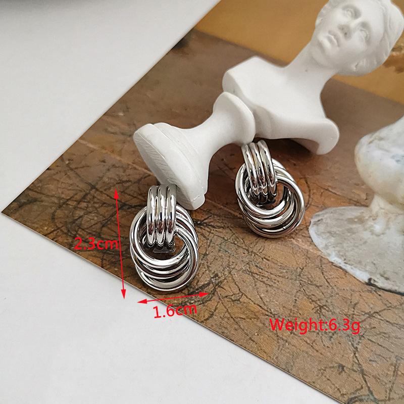 New Exaggerated Twist Metal Dangle Earrings for Women Gold Color Punk Fashion Female Hanging Earrings Boho Geometry Ear Zircon