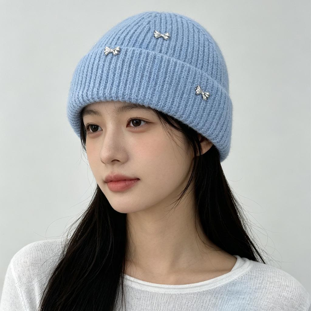 Autumn and winter cute bow simple knitted hat women warm sweet outdoor leisure pullover hat