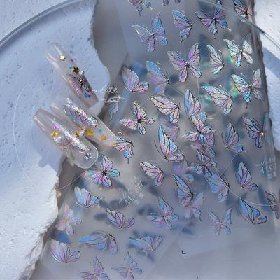 Nagelstickers met bronskleurige afwerking, vlinderstickers, zelf maken van decoraties.