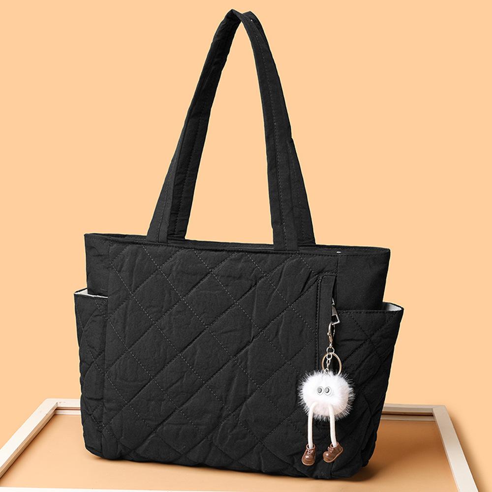 Tragetasche, Eine lässige und leichte Ein-Schulter-Handtasche mit großem Fassungsvermögen in Diamantform